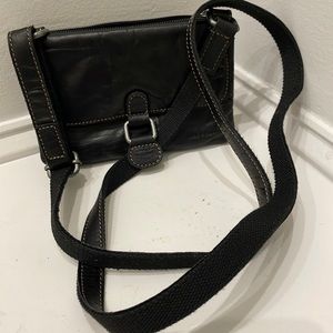 Jack Georges wallet on a string